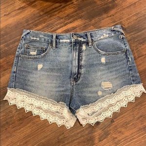 Free People denim shorts with lace trim